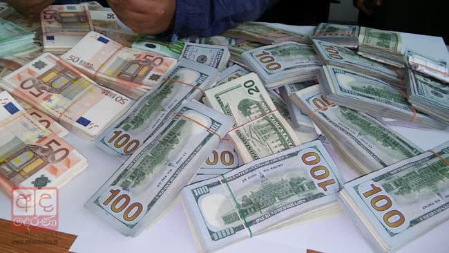 Woman held with foreign currency worth over Rs 28m