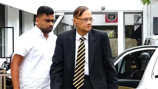 Ex-Minister G.L. Peiris arrives at Bribery Commission
