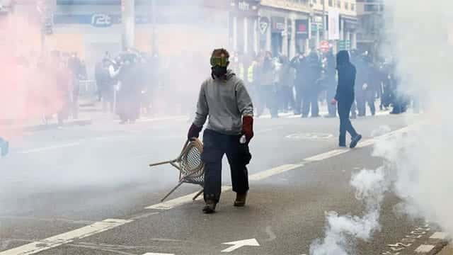 French police arrest 135 people, seize weapons: minister