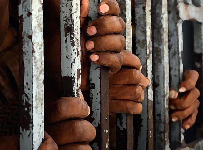 107 prison inmates contract COVID-19