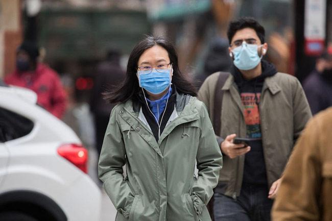 WHO urges fully vaccinated people to wear masks as Delta variant cases surge