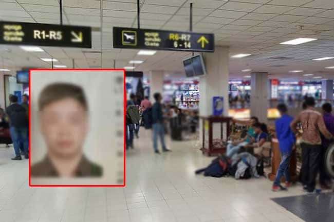 Chinese man detained with two passports has pending warrant in China, court told