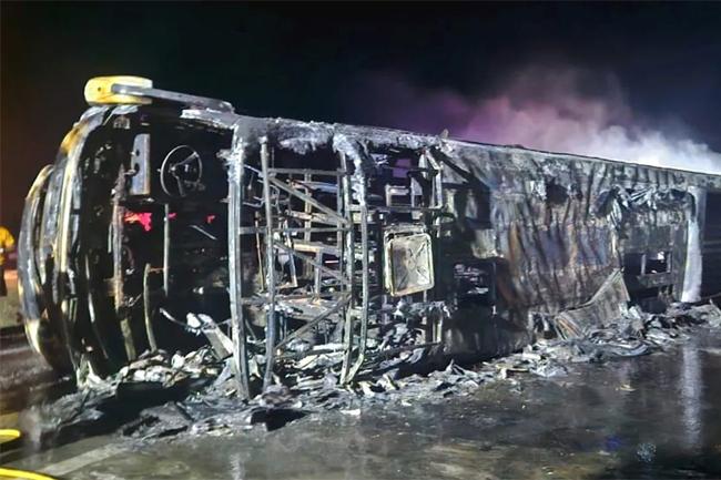At least 25 dead after bus crashes and catches fire in India