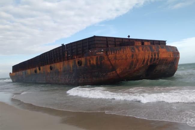 Huge foreign tugboat washes ashore in Mannar