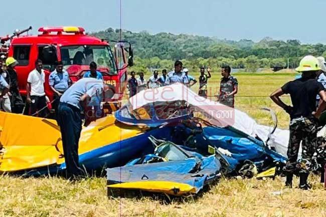 Two dead after training aircraft crashes near China Bay