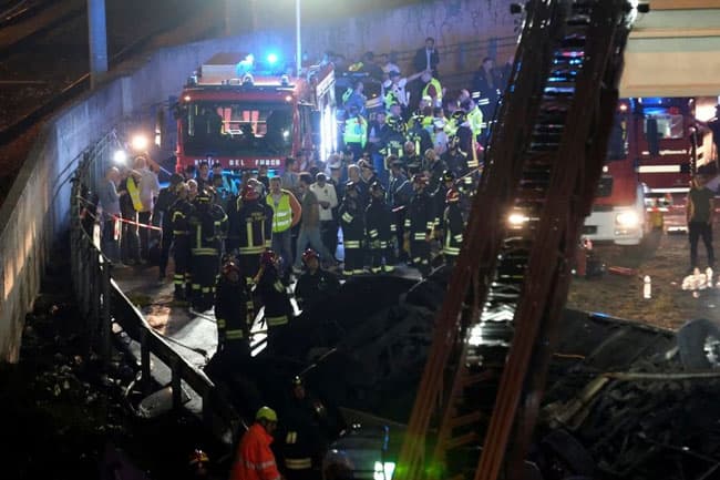 At least 21 dead after Italian bus carrying tourists falls from Venice overpass