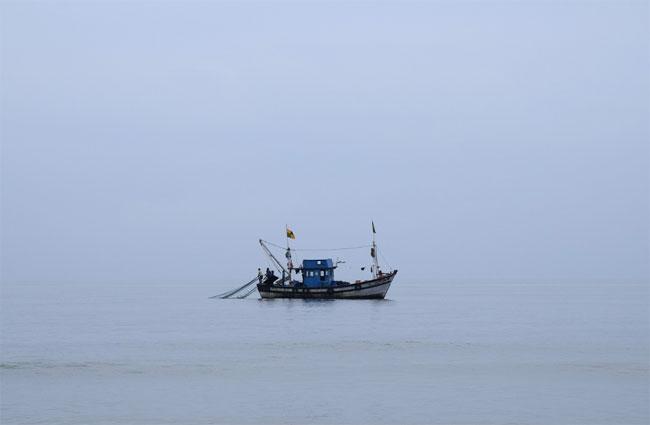 Four fishermen die after drinking from bottle found in sea; 2 survivors taken aboard merchant vessel