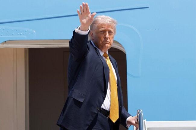 Trump arrives in Beijing for high-stakes summit with Xi