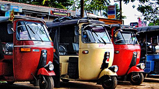 Three-wheeler operators block Colombo-Negombo main road