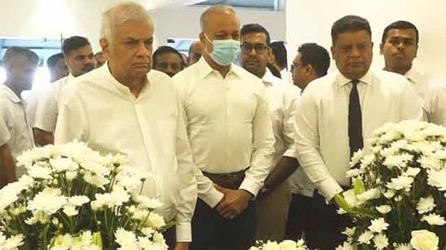 Ex-President Ranil pays final respects to former IGP C.D. Wickramaratne