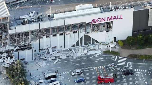 Japan quake injures at least 50, disrupts power and travel