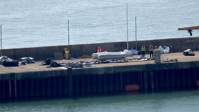 Record 230 migrants reach UK after crossing English Channel in inflatable 'mega-dinghy'