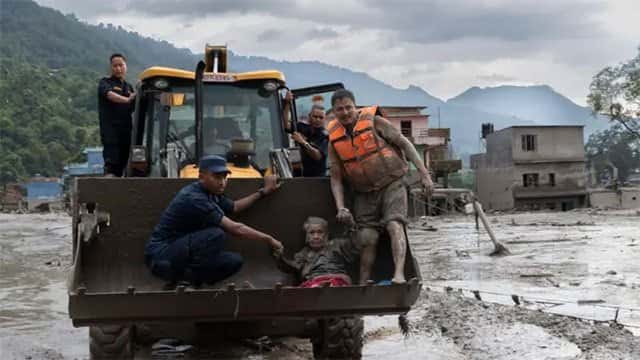 More than 150 dead and hundreds missing after flash floods hit Nepal-Tibet border