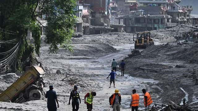 Nepal begins burials as flood death toll rises to 762